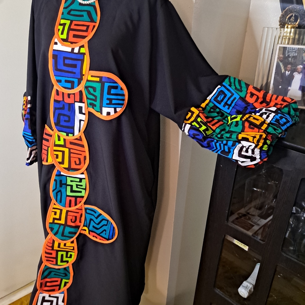 Stretchy gorgeous short dress. Designed with gorgeous Ankara prints
